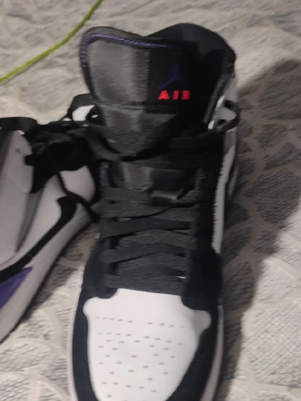Nike Air Jordan 1 Mid Black White Purple Accent Sneakers
